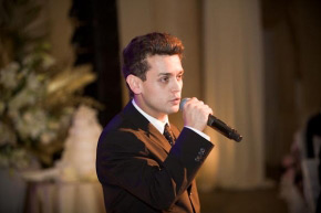 Michael Longoria sings at wedding